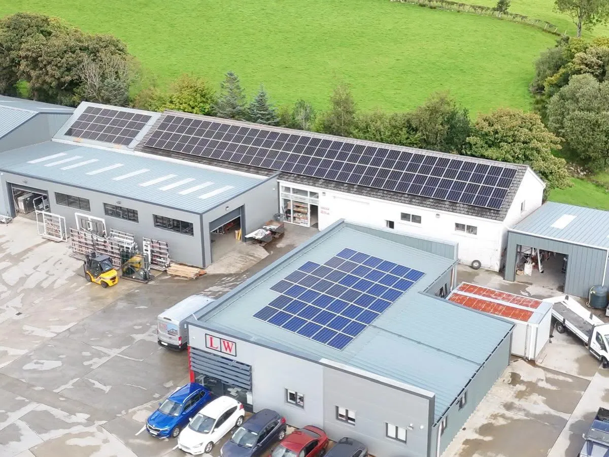 Aerial view of solar panels installed across a commercial premises