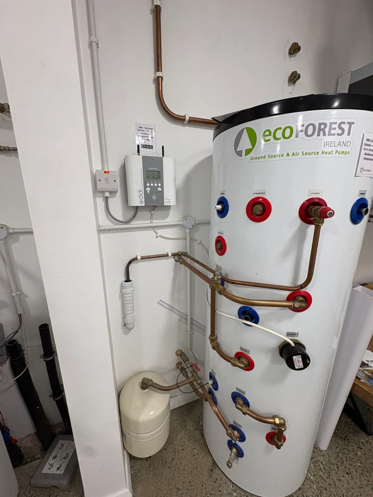 Ecoforest ground and air source heat pump hot water cylinder with copper pipework in the EHP showroom